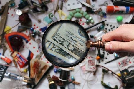 magnifying glass over many objects